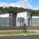 customfenceusingincisiondecorativemetalscreensaththefrontofahouse