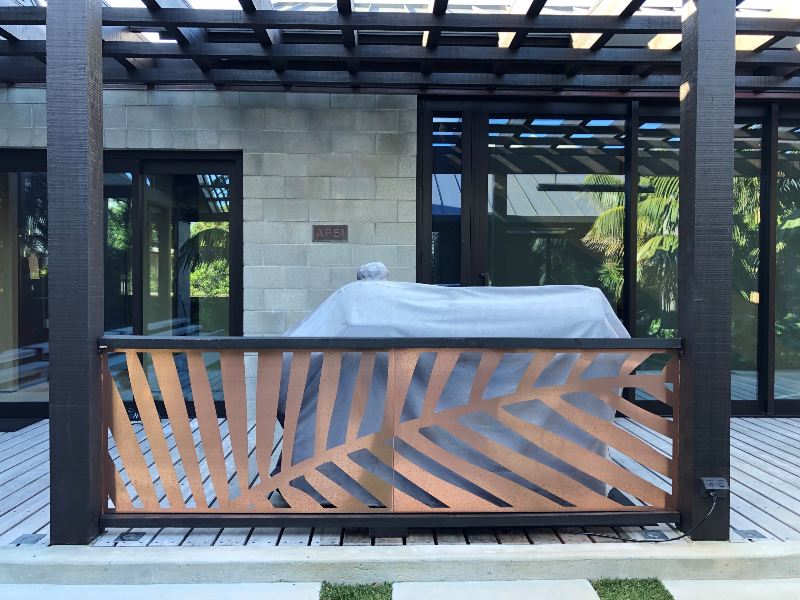 palm decorative metal screen featured on a deck