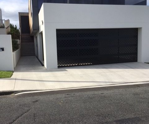 lotus-incision-garage-screen-custom-privacy-screen custommetalgatesinincisionlotusdesignusedasagaragescreenforprivacy
