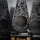 vintage outdoor fireplace with woodbox on display