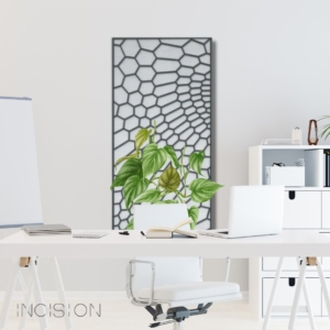 461928468_1068722338594518_8008593951551426464_n (1) office mockup with a decorative metal screen with a plant growing up it