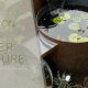 custom water feature corten steel with text overlay