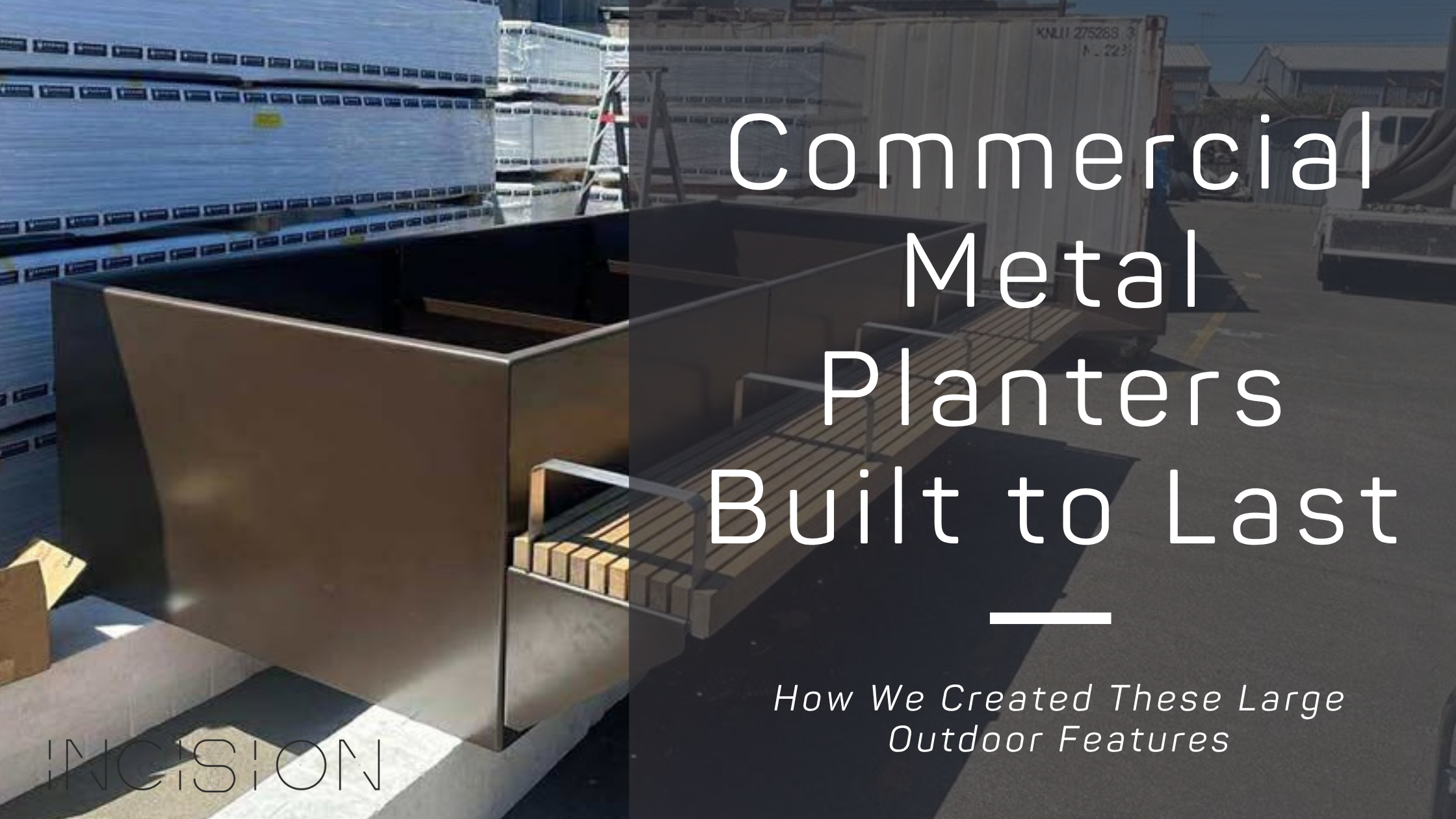 large scale commercial planters with seating getting ready to be loaded for delivery