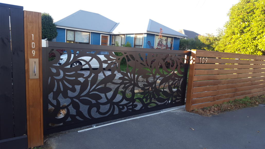 honeysuckle design incision decorative metal screen used as a gate on a driveway